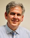 Dr. Roger Simnett AO